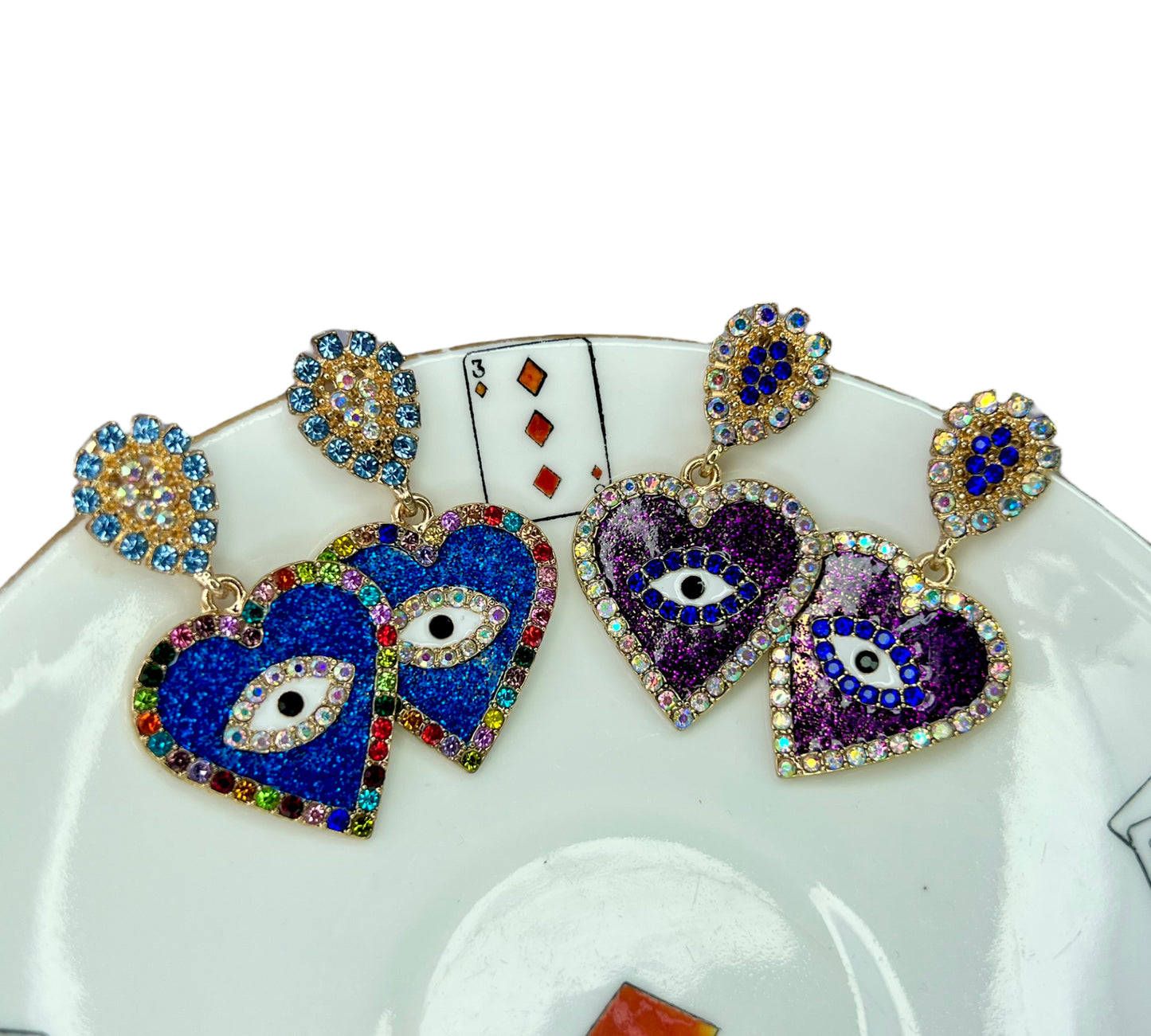 Diamante evil eye heart studs