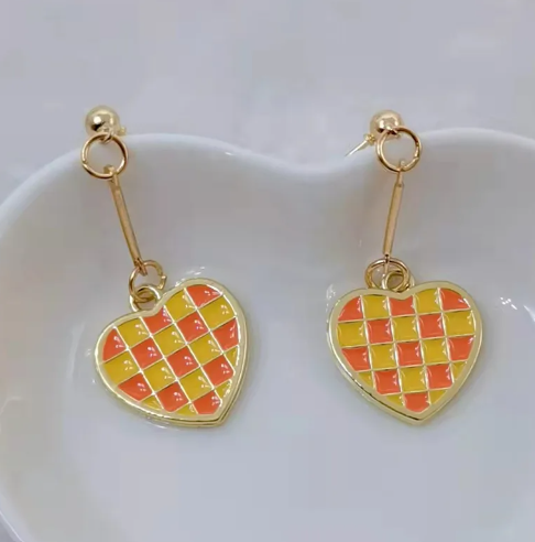 Checked heart studs